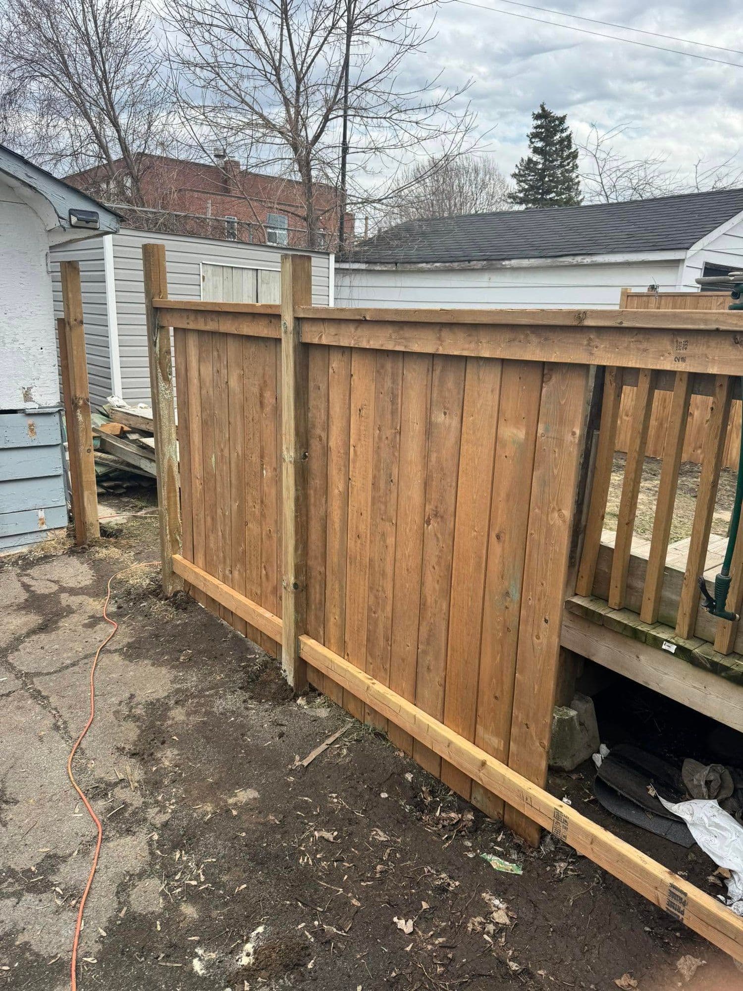 New wood privacy fence with matching gate